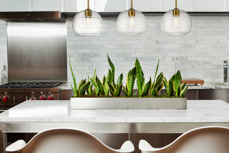 Harmony 3 Light 36" Linear Pendant in Olde Brass in a room setting