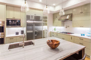 Ayra 1 Light 12" Pendant in Brushed Nickel in a room setting