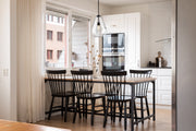 Ayra 1 Light 12" Pendant in Matte Black in a room setting