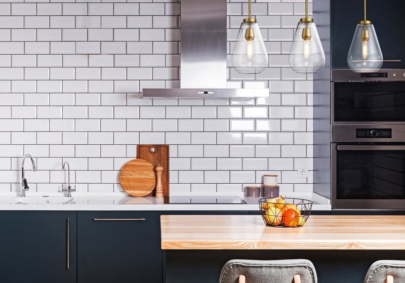 Ayra 3 Light 36" Linear Pendant in Olde Brass in a room setting
