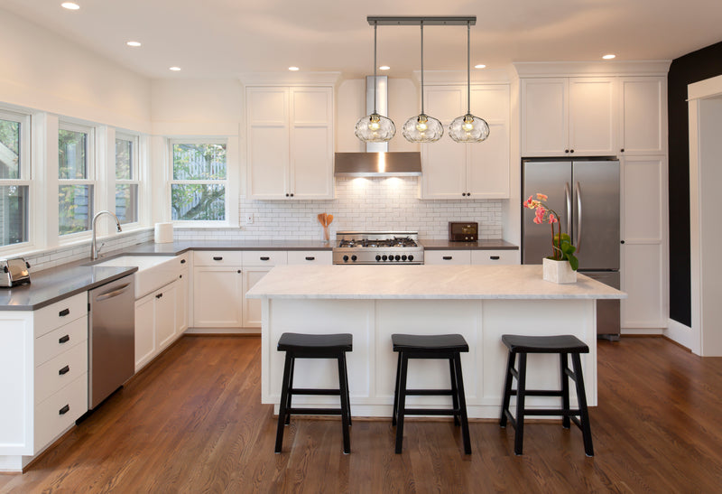 Chloe 3 Light 36" Linear Pendant in Brushed Nickel in a room setting