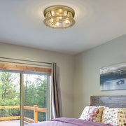 Cape Harbor 4 Light 20" Flush Mount in Rubbed Brass in a room setting