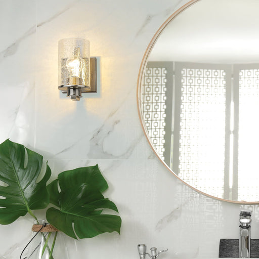 Beckett 1 Light 4.5" Wall Sconce in Brushed Nickel in a room setting
