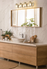 Beckett 4 Light 34" Vanity in Brushed Nickel in a room setting