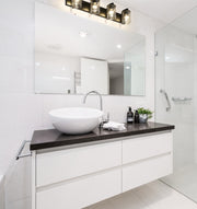 Beckett 4 Light 34" Vanity in Matte Black in a room setting