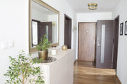Clarion 2 Light 12" Flush Mount in Rubbed Brass in a room setting