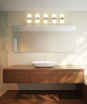 Artemis 10 Light 45" Vanity in Brushed Nickel in a room setting