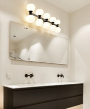 Artemis 10 Light 45" Vanity in Matte Black in a room setting