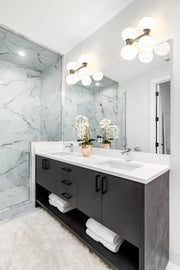 Artemis 4 Light 13" Vanity in Brushed Nickel in a room setting