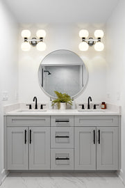 Artemis 4 Light 13" Vanity in Chrome in a room setting
