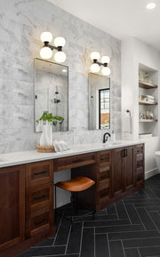 Artemis 4 Light 13" Vanity in Matte Black in a room setting