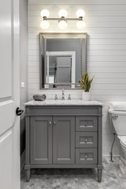 Artemis 6 Light 25" Vanity in Brushed Nickel in a room setting