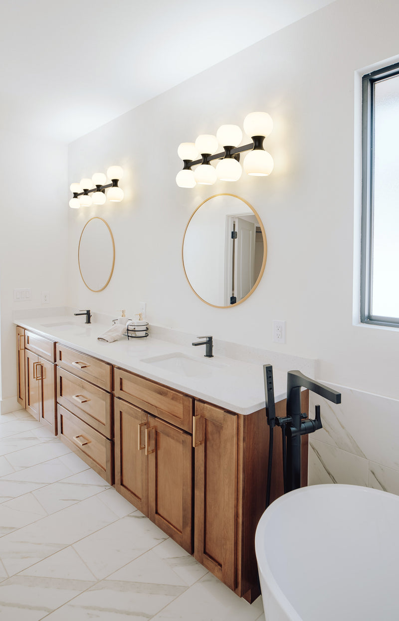 Artemis 8 Light 35" Vanity in Matte Black in a room setting