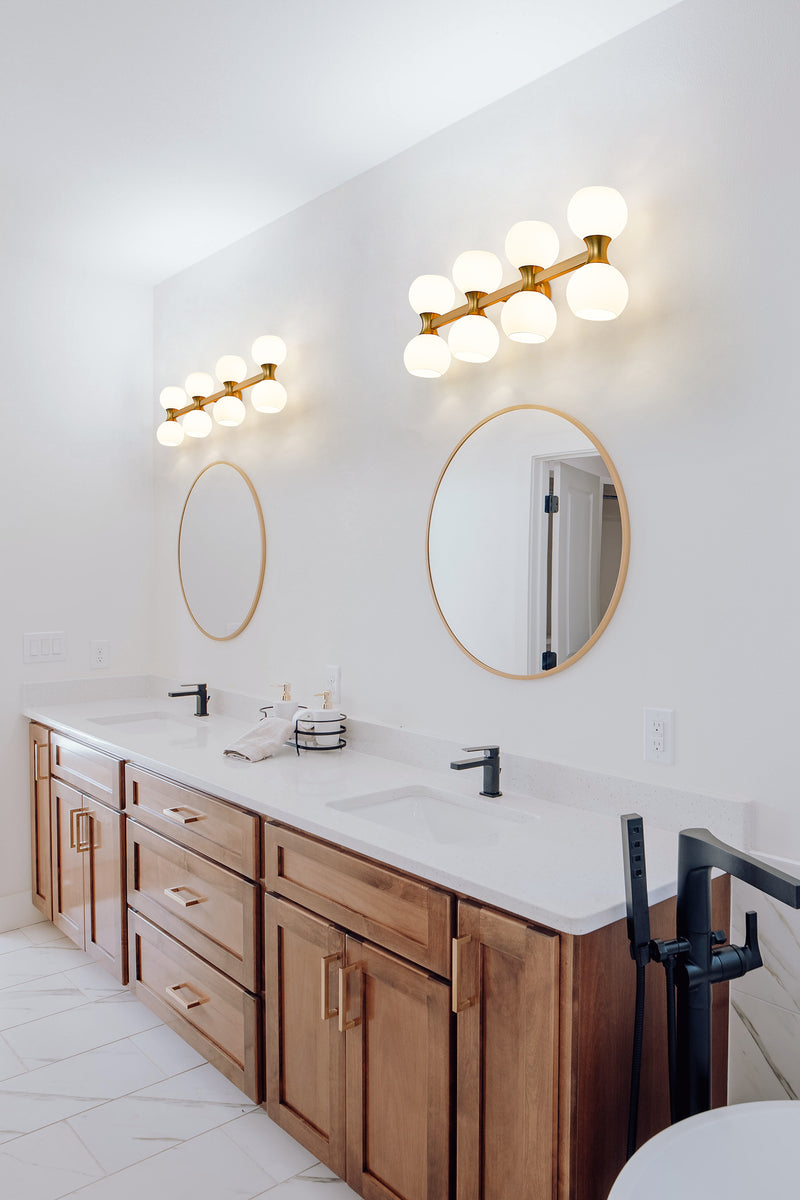 Artemis 8 Light 35" Vanity in Modern Gold in a room setting