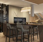 Counterpoint 5 Light 42" Linear Pendant in Modern Gold in a room setting