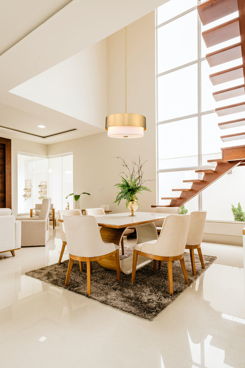 Counterpoint 5 Light 24" Pendant in Modern Gold in a room setting