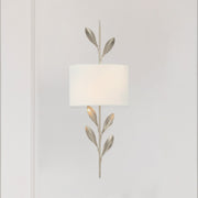 Broche 2 Light 8.5" Sconce in Antique Silver in a room setting