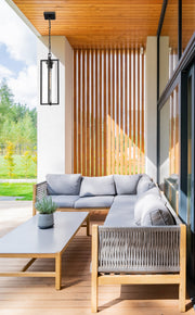 Aura 1 Light 8" Outdoor Chain Mount Ceiling Fixture in Black in a room setting