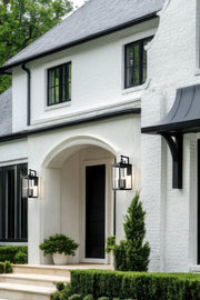 Hartwell 5 Light 12" Outdoor Wall Light in Sand Black in a room setting