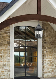 Raphael 5 Light 18" Outdoor Chain Mount Ceiling Fixture in Sand Black in a room setting