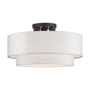 Manorwood 3-Light 18" Semi-Flush Mount with Off-White Shade in Bronze