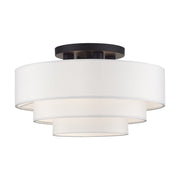 Manorwood 4-Light 21" Semi-Flush Mount with Off-White Shade in Bronze
