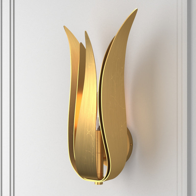 Broche 1 Light 8" Sconce in Antique Gold in a room setting