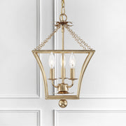 Broche 3 Light 11" Chandelier in Antique Gold in a room setting