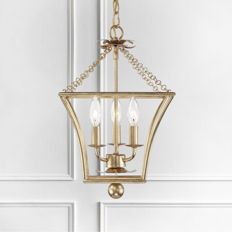 Broche 3 Light 11" Chandelier in Antique Gold in a room setting