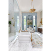 Broche 6 Light 24.5" Chandelier in Antique Gold in a room setting