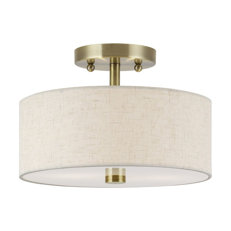 Meridian 2-Light 11" Oatmeal Shade Semi-Flush Mount in Antique Brass
