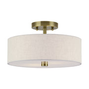 Meridian 2-Light 13" Oatmeal Shade Semi-Flush Mount in Antique Brass