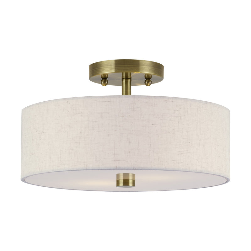 Meridian 2-Light 13" Oatmeal Shade Semi-Flush Mount in Antique Brass