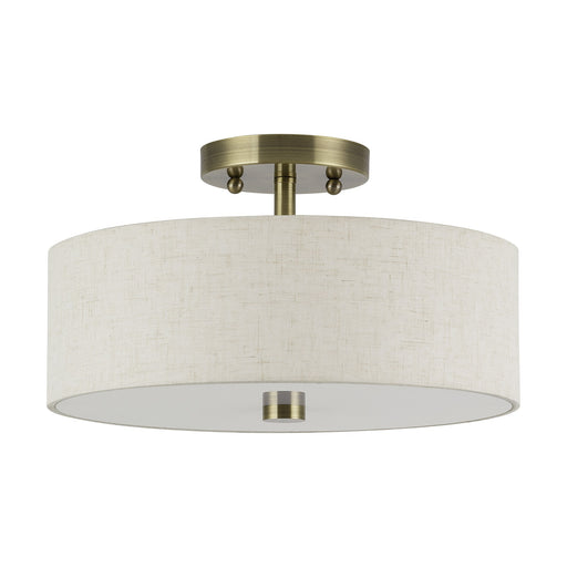 Meridian 2-Light 13" Oatmeal Shade Semi-Flush Mount in Antique Brass