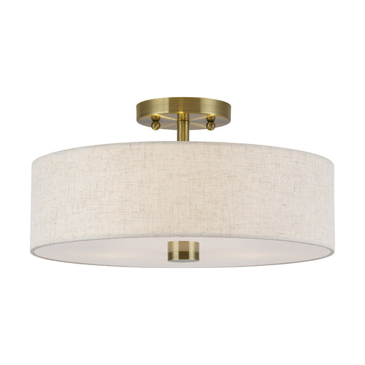 Meridian 3-Light 15" Oatmeal Shade Semi-Flush Mount in Antique Brass