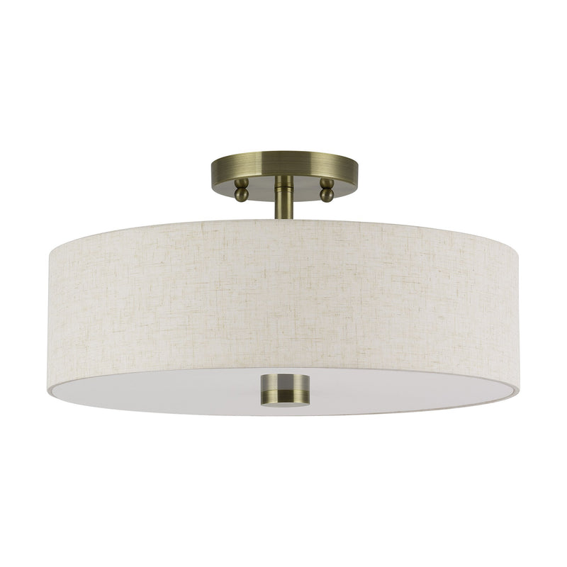 Meridian 3-Light 15" Oatmeal Shade Semi-Flush Mount in Antique Brass