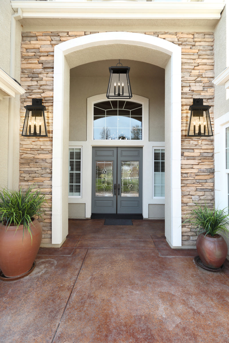 Broughton 4 Light 12.5" Outdoor Wall Light in Black in a room setting