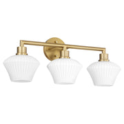 Cassini 3 Light Vanity in Aged Brass