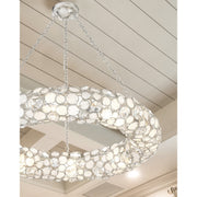 Palla 8 Light 32" Chandelier in Antique Silver in a room setting