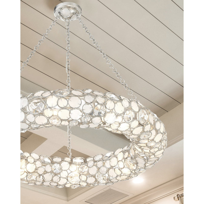 Palla 8 Light 32" Chandelier in Antique Silver in a room setting