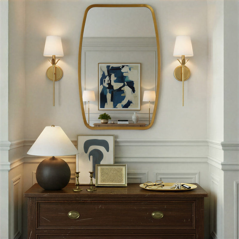 Broche 1 Light 6" Sconce in Antique Gold in a room setting