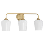 Raymond 3 Light Vanity with Opal Glass in Aged Brass