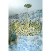 Broche 6 Light 27" Chandelier in Champagne Green Tea in a room setting