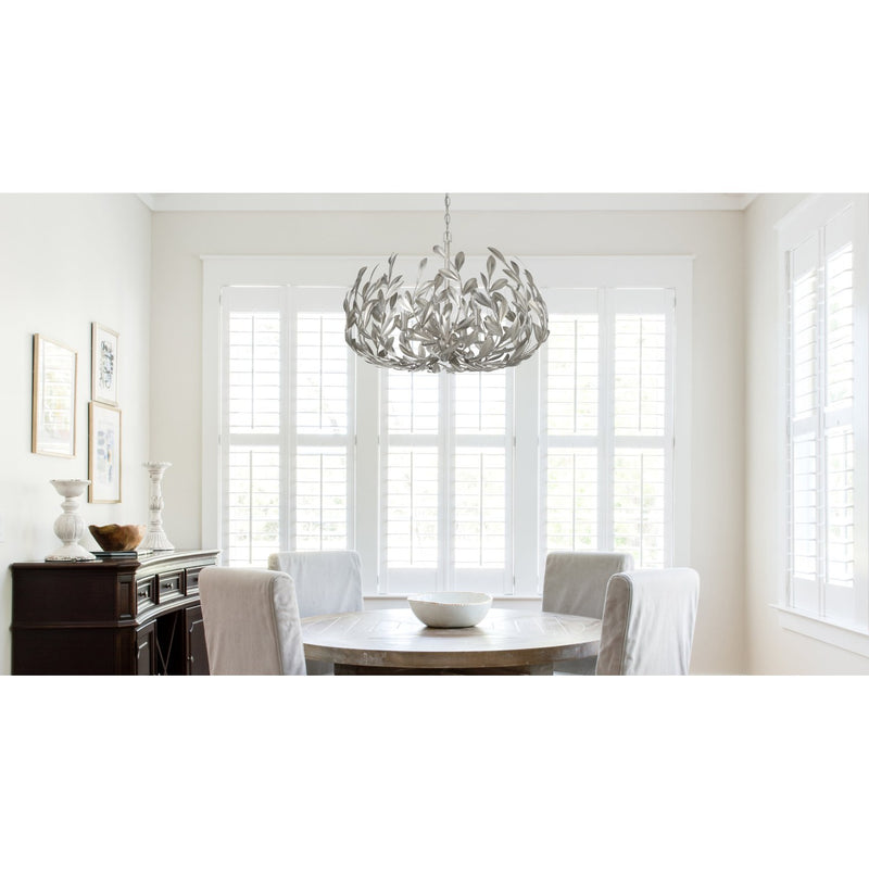 Broche 6 Light 27" Chandelier in Antique Silver in a room setting