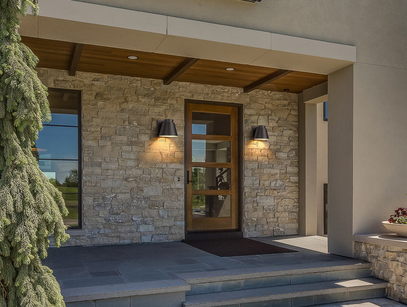 Asher 1 Light 12" Outdoor Wall Light in Outdoor Rubbed Bronze in a room setting