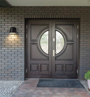 Asher 1 Light 5.5" Outdoor Wall Light in Outdoor Rubbed Bronze in a room setting