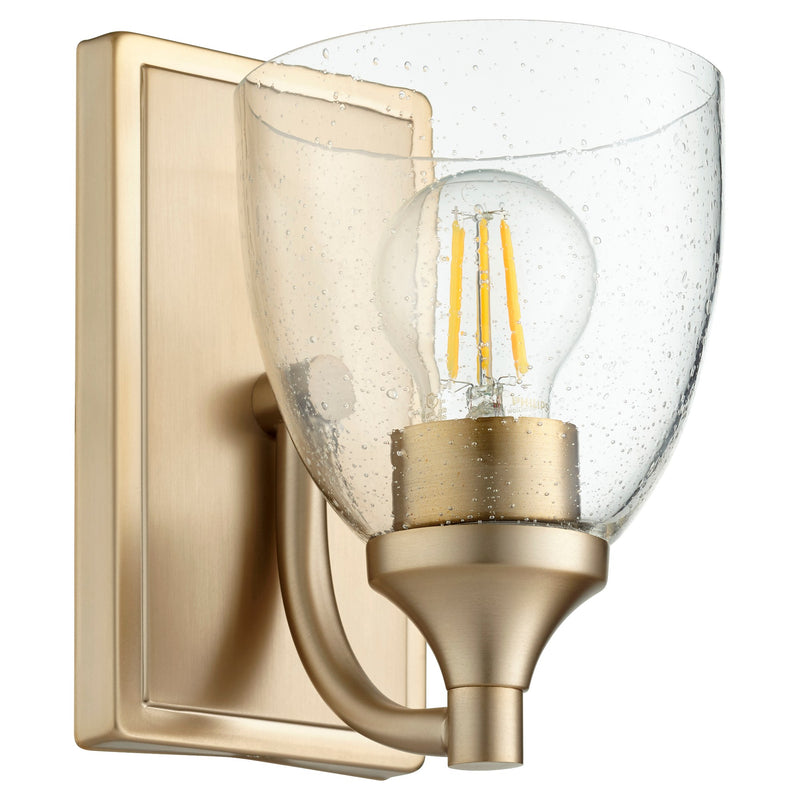 Enclave 1 Light Clear Seeded Wall Sconce in Aged Brass