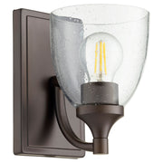 Enclave 1 Light Clear Seeded Wall Sconce in Oiled Bronze