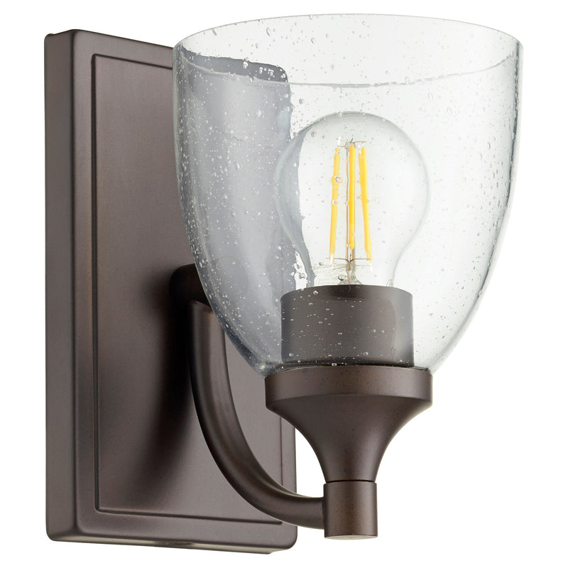 Enclave 1 Light Clear Seeded Wall Sconce in Oiled Bronze