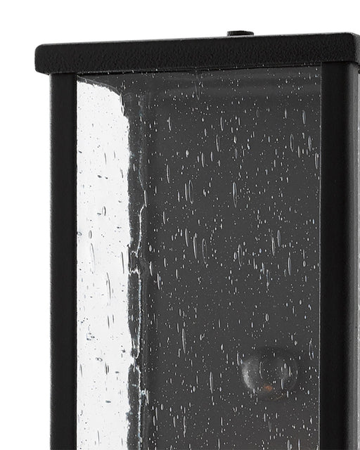 Tanzy Small Outdoor Wall Sconce in Midnight Black / Clear Seeded